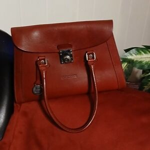 Beautifull Vintage Dooney and Bourke Burgundy  Leather Handbag